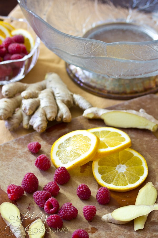 Making  Punch with Raspberry and Orange Liqueur | ASpicyPerspective.com #cocktails #newyearseve #holidays