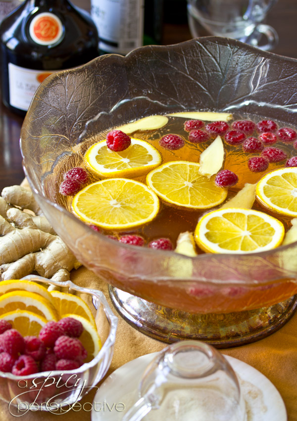 Bubbly Champagne Punch with Raspberry and Orange Liqueur | ASpicyPerspective.com #cocktails #newyearseve #holidays